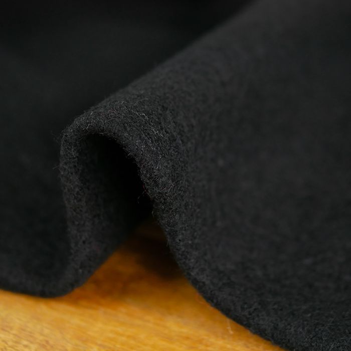 Tissu 100% laine bouillie uni oeko-tex - noir x 10 cm