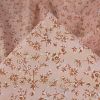 Tissu coton enduit fleurs Becca - rose clair x 10 cm