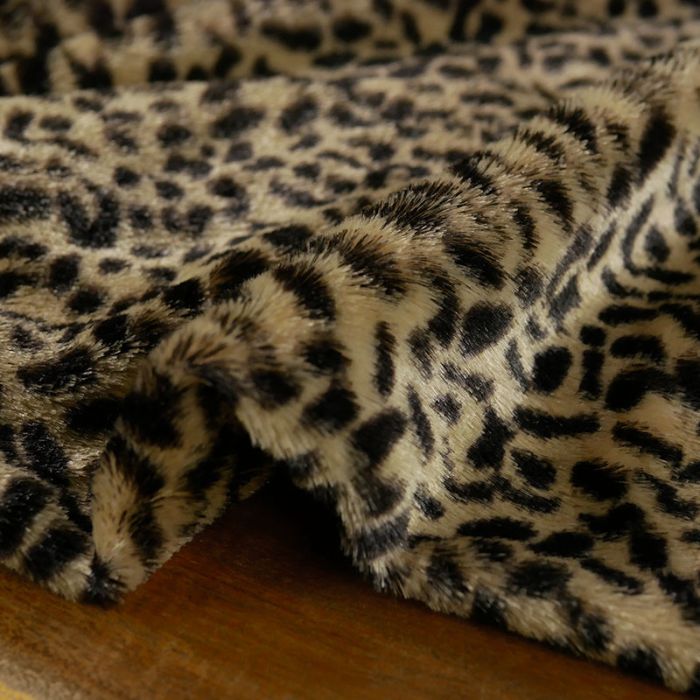 Tissu fausse fourrure léopard haute couture - beige x 10 cm