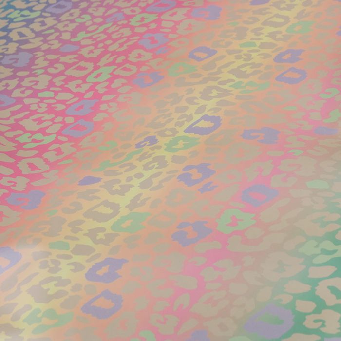 Tissu imperméable arc-en-ciel léopard - pastel x 10 cm