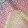 Tissu imperméable métallisé léopard - pastel x 10 cm