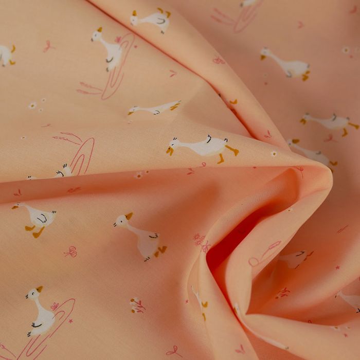 Tissu popeline coton motifs oies - rose saumon x 10 cm