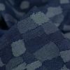 Tissu denim jacquard effet patchwork - bleu foncé x 10 cm