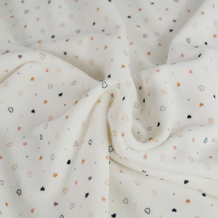 Tissu jersey velours nicky coeur - écru x 10 cm