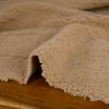 Tissu sherpa fausse fourrure mouton - marron clair x 10 cm