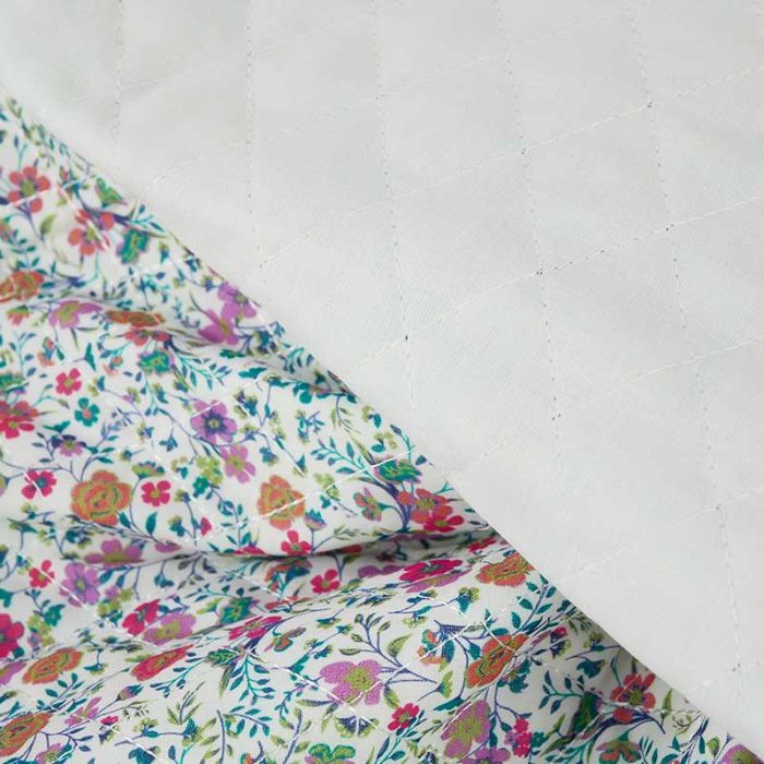 Tissu matelassé doudoune fleurs - multicolore x 10 cm