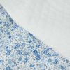 Tissu matelassé doudoune fleurs - bleu x 10 cm