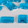 Cabochon rectangle à facettes 18mm bleu canard x1