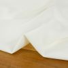 Tissu crêpe stretch polyester uni - blanc cassé x 10 cm