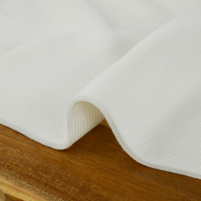 Tissu jersey maille tricot - blanc cassé x 10 cm