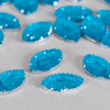 Cabochon ovale à facettes 15mm bleu canard x1