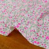 Tissu coton motifs fleurs fluo - rose x 10 cm