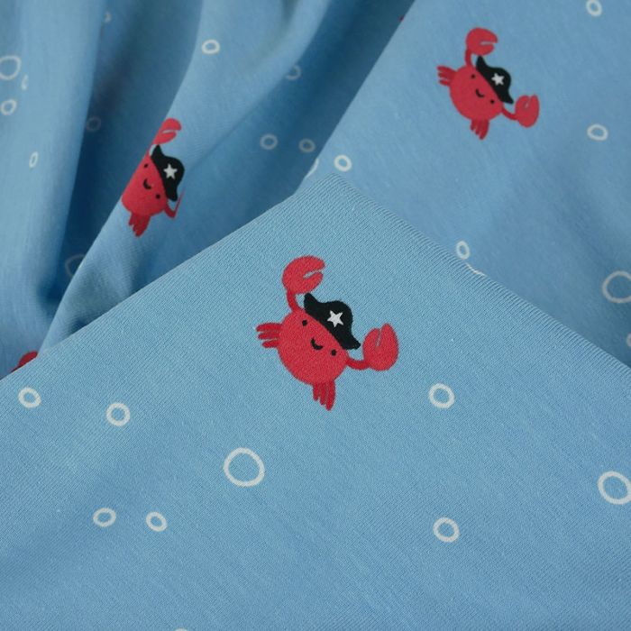 Tissu jersey fin petits crabes - bleu ciel x 10 cm