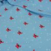 Tissu jersey fin petits crabes - bleu ciel x 10 cm