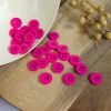 Bouton 4 trous unis en résine fuschia 11mm
