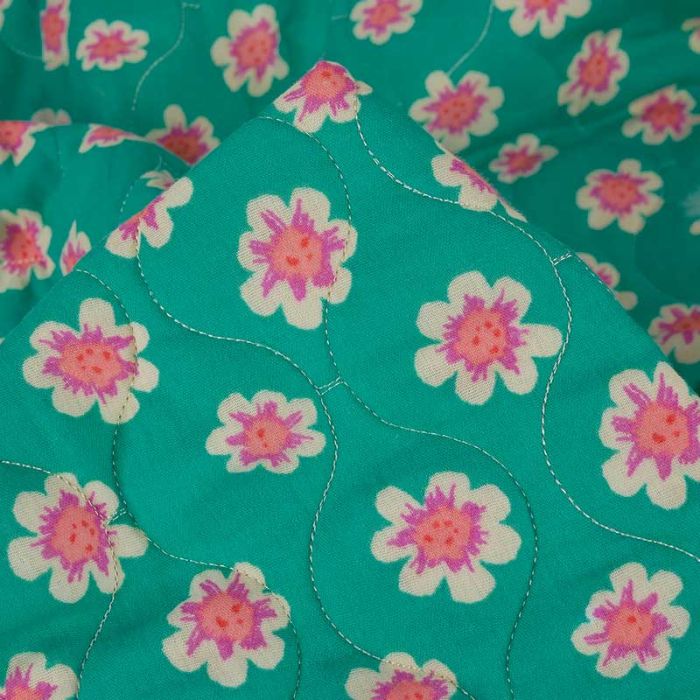 Tissu matelassé réversible fleurs - vert émeraude x 10 cm