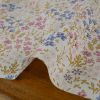 Tissu coton enduit jardin fleuri - blanc cassé x 10 cm