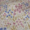 Tissu coton enduit jardin fleuri - blanc cassé x 10 cm