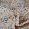 Tissu coton enduit jardin fleuri - blanc cassé x 10 cm