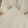 Tissu jersey coton bio uni - blanc cassé x 10cm