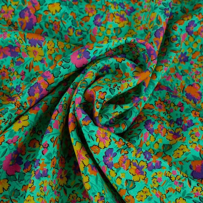 Tissu viscose fleurs multicolore - turquoise x 10 cm