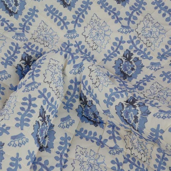 Tissu matelassé décor végétal - bleu lavande x 10 cm