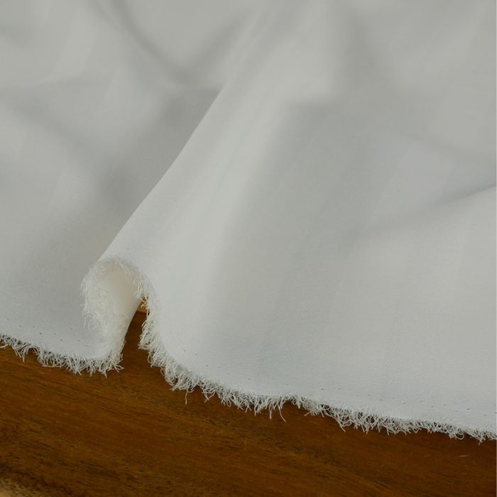 Tissu crêpe soie et viscose rayures haute couture - écru x 10 cm