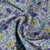 Tissu jersey fin fleurs Jollia - bleu x 10 cm