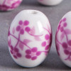 Perle en céramique Fleurie ovale rose 18mm x1