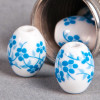 Perle en céramique Fleurie ovale bleu turquoisen 10mm x1