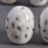 Perle en céramique Fleurie ovale blanche 18mm x1