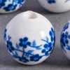 Perle en céramique Fleurie ronde Bleu roi 20mm x1