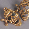 Breloque tête de mort pirate 27mm dorée x1