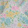 Tissu jersey fin fleurs pastel - écru x 10 cm