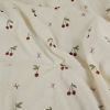 Tissu jersey éponge coton cerises - écru x 10 cm