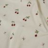 Tissu jersey éponge coton cerises - écru x 10 cm
