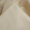Tissu double gaze pailletée - écru x 10 cm