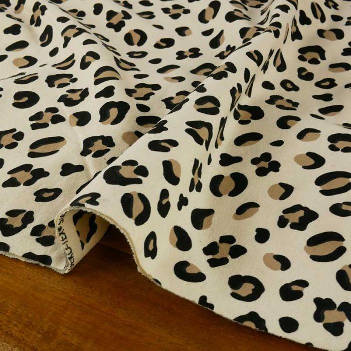 Tissu jersey sweat léger léopard - écru x 10 cm