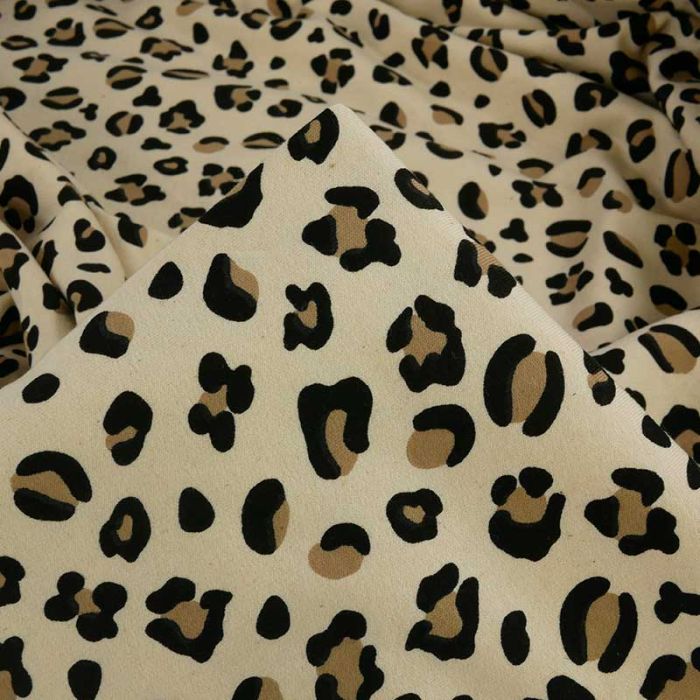 Tissu jersey sweat léger léopard - écru x 10 cm
