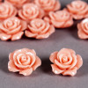 Fleur en poudre de nacre 15 mm rose clair x1