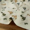 Tissu popeline coton enfant dinosaures - écru x 10 cm