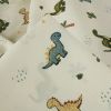 Tissu popeline coton enfant dinosaures - écru x 10 cm