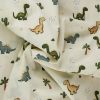 Tissu popeline coton enfant dinosaures - écru x 10 cm
