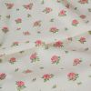 Tissu popeline coton fleurs roses - blanc cassé x 10 cm
