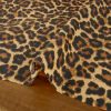 Tissu cretonne coton enduit léopard - beigex 10 cm
