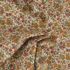 Tissu popeline coton fleurs orange - blanc cassé x 10 cm