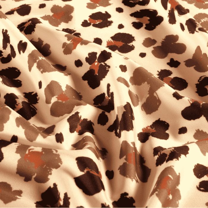 Tissu maillot de bain léopard - marron x 10 cm