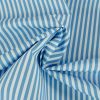 Tissu short de bain déperlant rayures - bleu ciel x 10 cm