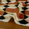Tissu satin de viscose motifs géométriques - terracotta x 10 cm