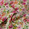 Tissu viscose motifs fleurs multicolore - écru x 10 cm